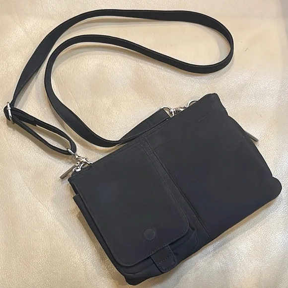 Hobo crossbody bag in black with silver tone hardware, 9 x 6.5 - Picture 1 of 11